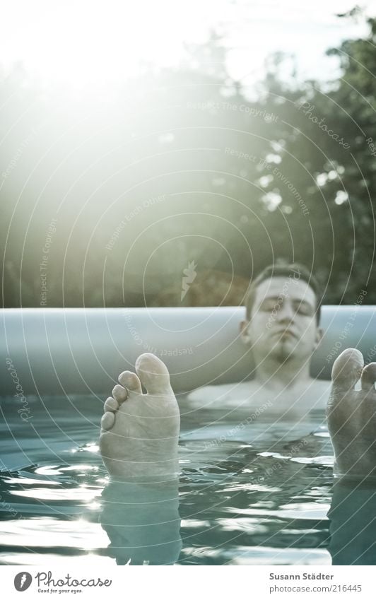 summer longing Man Adults Feet 1 Human being 18 - 30 years Youth (Young adults) To enjoy Rest Sleep Doze Swimming pool Garden Summer Glittering Waves Wet