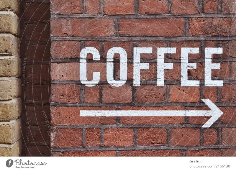 Coffee - please follow the arrow Wall (barrier) Wall (building) Facade Stone Characters Signs and labeling Signage Warning sign Discover To enjoy Drinking Retro