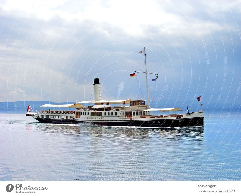 Hohentwiel Clouds White Black Steamer Watercraft Passenger ship Austria Switzerland Paddle steamer Leisure and hobbies Navigation Lake Constance Sun Weather