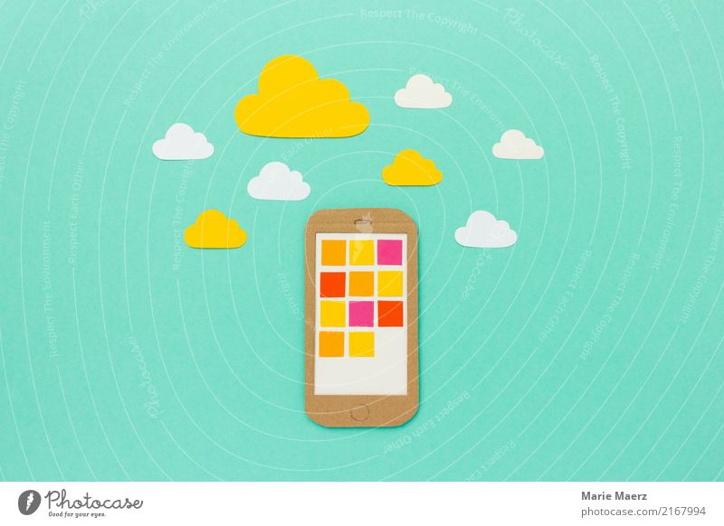 In the cloud - mobile phone with app icons and clouds Cellphone PDA Advancement Future Internet Work and employment Discover Communicate Free Infinity Modern