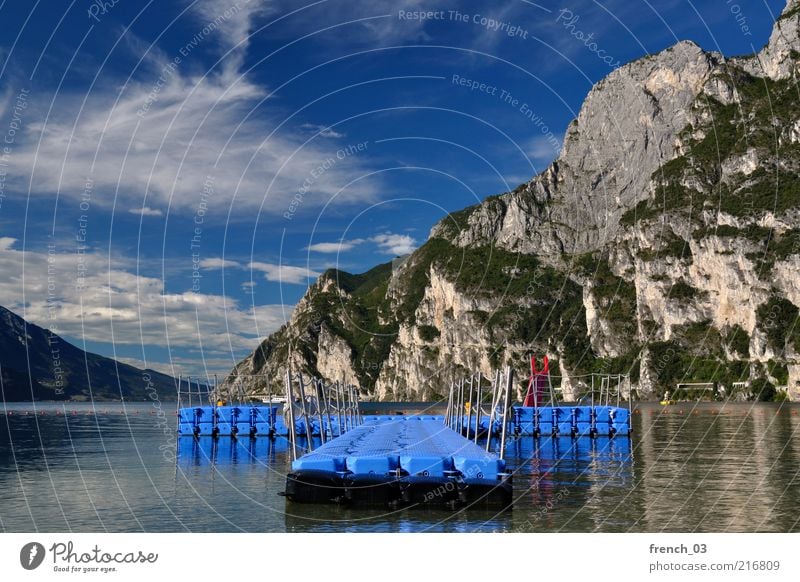 again Relaxation Calm Vacation & Travel Sun Environment Water Sky Clouds Beautiful weather Mountain Dolomites Lake Lake Garda Riva del Garda Italy Blue