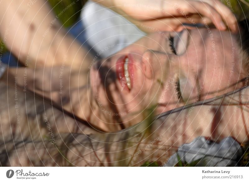 Shadow play II Human being Feminine Young woman Youth (Young adults) Woman Adults 1 18 - 30 years Spring Summer Beautiful weather Grass Meadow Think Lie Sleep