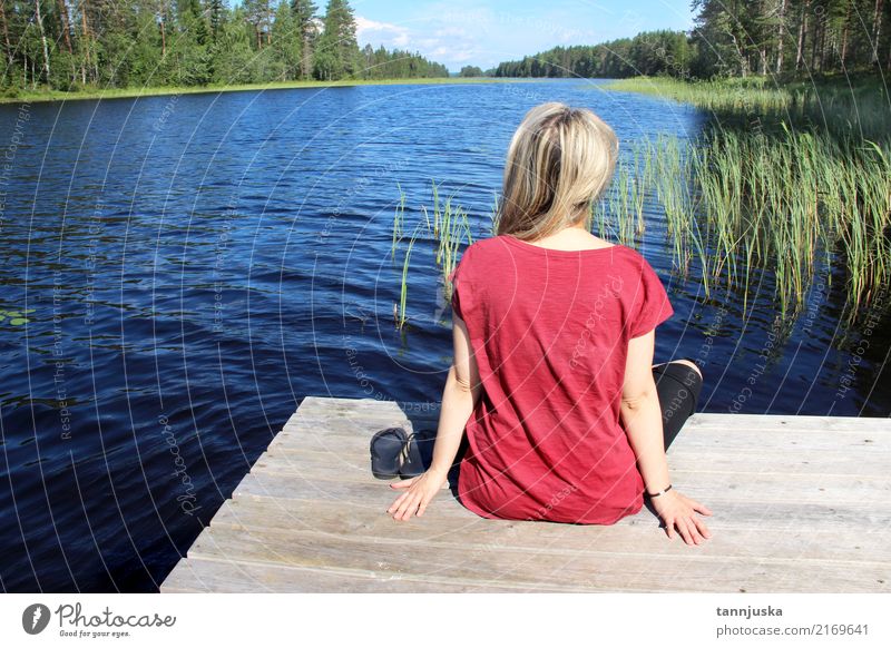 Young woman sitting near lake in Karelia, Finland Lifestyle Relaxation Vacation & Travel Tourism Camping Summer Human being Woman Adults 1 18 - 30 years