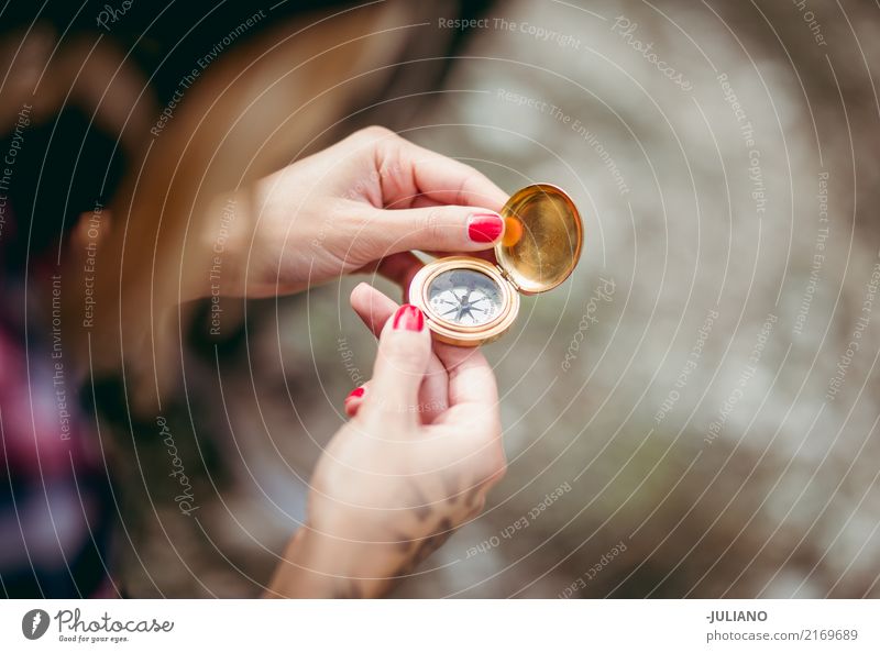 Close up of hands holding compass Leisure and hobbies Hand Environment Nature Earth Spring Summer Autumn Meadow Forest Hill Rock Canyon Compass (Navigation)