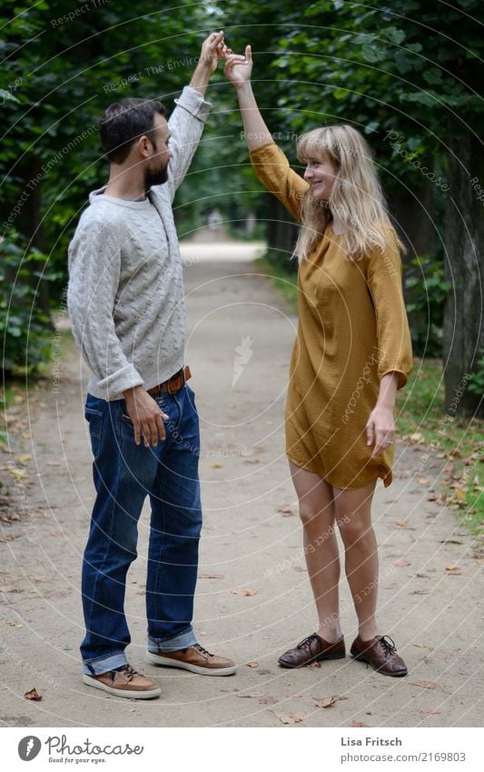 Turn around! Couple Partner 18 - 30 years Youth (Young adults) Adults Environment Nature Beautiful weather Tree Park Dress Long-haired To hold on To enjoy