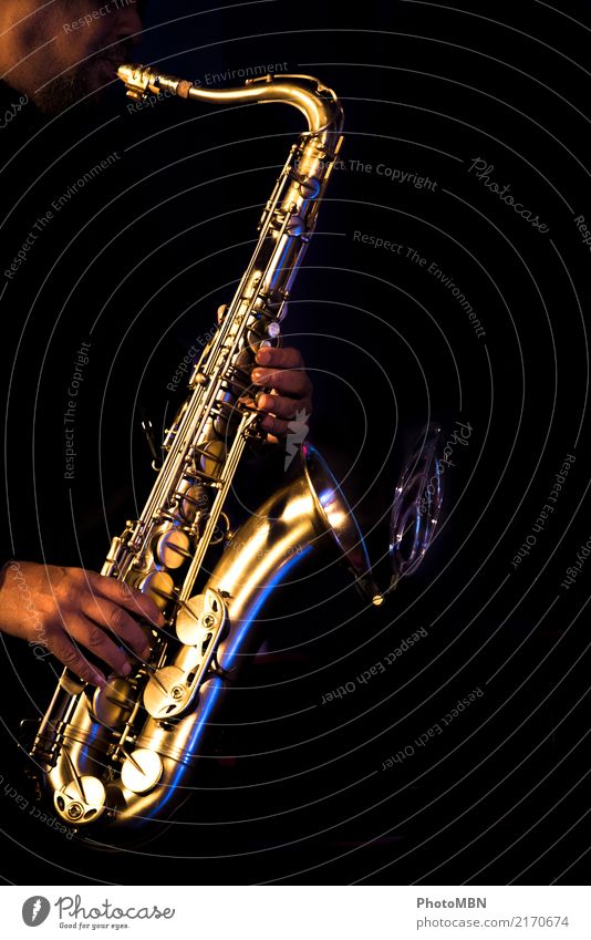 sax Lifestyle Design Musician Artist Entertainment electronics Musical instrument Masculine Hand 1 Human being 45 - 60 years Adults jazz concert Concert