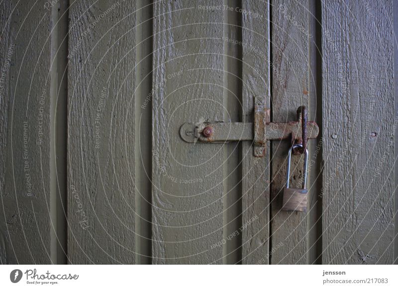 You're not coming in here! Door Lock Mysterious Closed Padlock Locking bar Derelict Rust Varnished Colour photo Subdued colour Close-up Detail Pattern