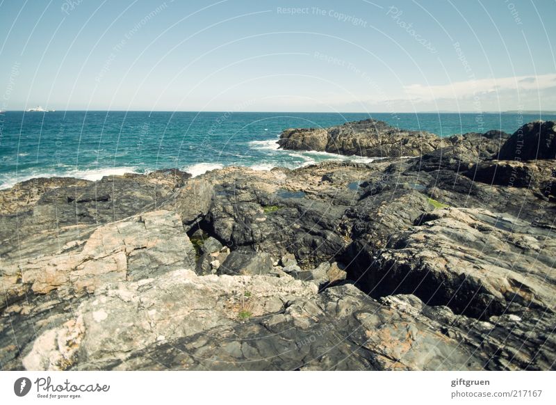 rocky coast Environment Nature Landscape Elements Water Sky Climate Beautiful weather Coast Ocean Rock Stony Stone Rocky coastline Horizon Waves Extensive