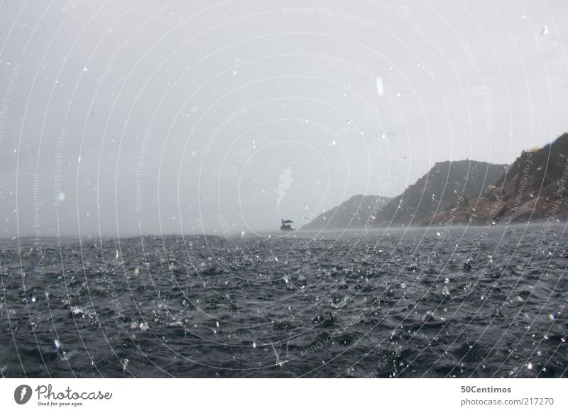 Rain, storm and cold Adventure Freedom Ocean Waves Nature Water Drops of water Sky Bad weather Storm Wind Gale Coast Thailand Fishing boat Threat Cold Wet Blue