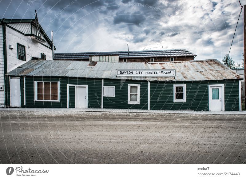 Dawson City Hostel Small Town Deserted Facade Broken Retro Gloomy Green Nostalgia Vacation & Travel Decline Past Transience Yukon Alaska Subdued colour