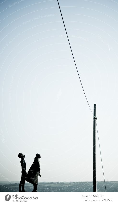 HansundFranzguckinthe air Masculine Man Adults 2 Human being Observe Looking Statue Electricity pylon Above Heavenly Sky Cloudless sky Monument Couple