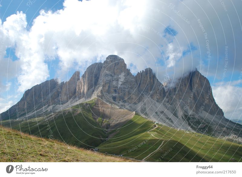 mountain world Mountain Environment Nature Landscape Sky Clouds Sun Rock Alps Peak Discover Relaxation Blue Gray Green White Emotions Contentment Colour photo