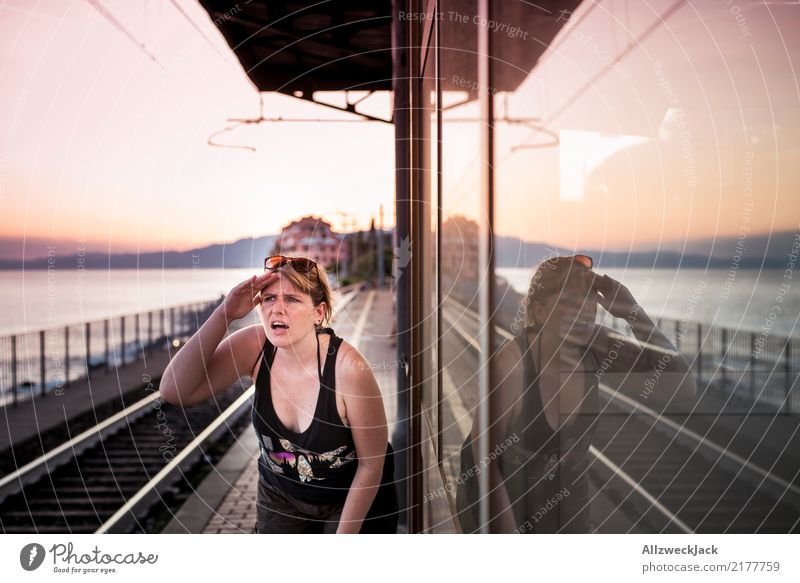 Waiting for the train 2 Vacation & Travel Tourism Trip Adventure Far-off places City trip Sightseeing Night life Summer Summer vacation Ocean Woman 1 Person