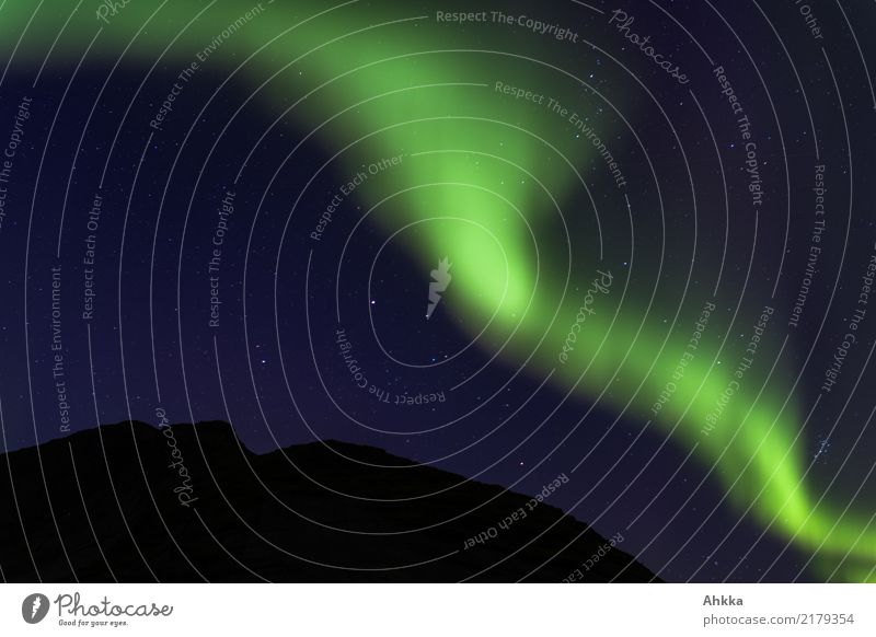 Green aurora before starry sky and mountain silhouette, Lofoten Vacation & Travel Adventure Nature Sky Cloudless sky Night sky Stars Aurora Borealis Mountain