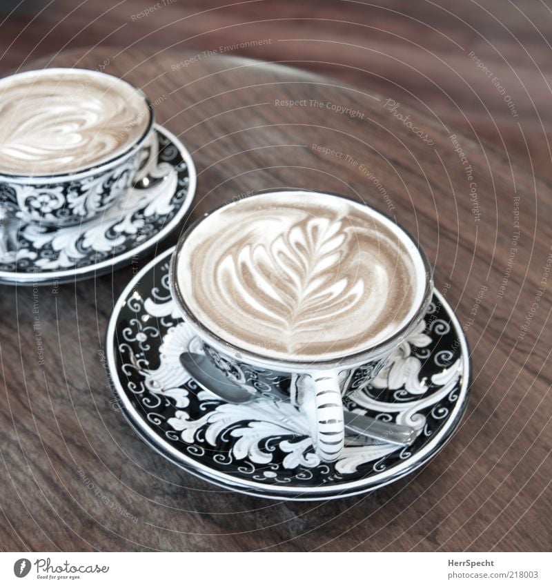 Cappuccino at La Colombe, Tribeca Beverage Hot drink Coffee Cup Wood Brown Black Crockery Saucer Pattern Wood grain Coffee froth side table Spoon Café