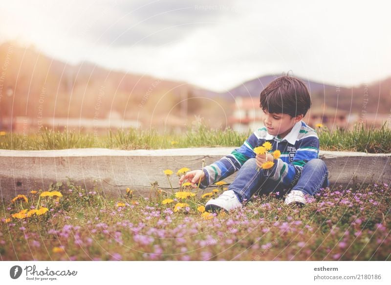 Happy child with flowers in spring Joy Wellness Vacation & Travel Adventure Freedom Human being Masculine Child Toddler Infancy 1 3 - 8 years Environment Nature