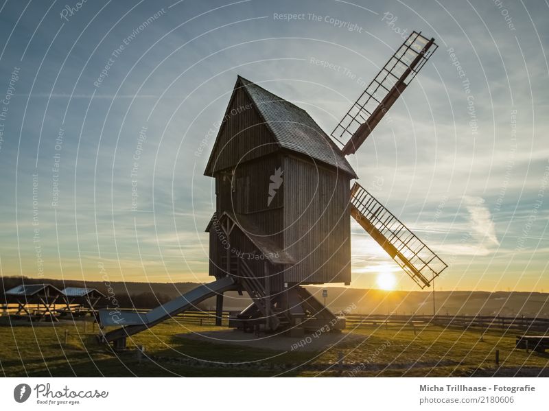 Windmill in the evening light Windmill vane Nature Landscape Sky Clouds Sun Sunrise Sunset Sunlight Weather Beautiful weather Plant Grass Manmade structures