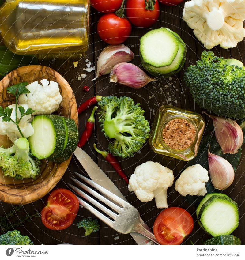 Fresh vegetables on a wooden table top view Vegetable Herbs and spices Eating Vegetarian diet Diet Bottle Fork Spoon Summer Table Group Autumn Leaf Collection