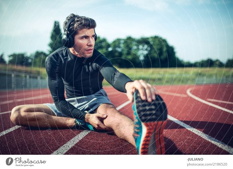 Young runner is stretching before workout Nutrition Lifestyle Healthy Athletic Fitness Leisure and hobbies Sports Sports Training Track and Field Sportsperson