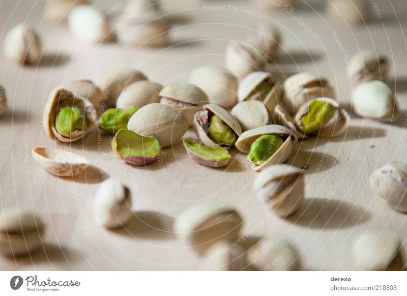 pistachios Food Nut Fresh Green Nutrition Colour photo Subdued colour Studio shot Close-up Detail Artificial light Flash photo Blur Shallow depth of field