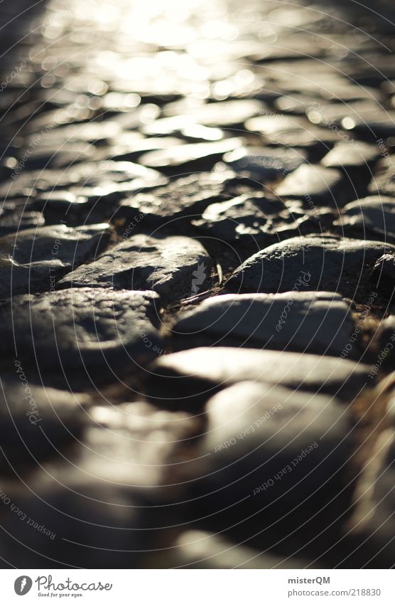 Hot plaster. Lanes & trails Pavement Cobblestones Down-to-earth Ground level Dark Robust Stone Stone path Calm Sidewalk Solid Colour photo Subdued colour