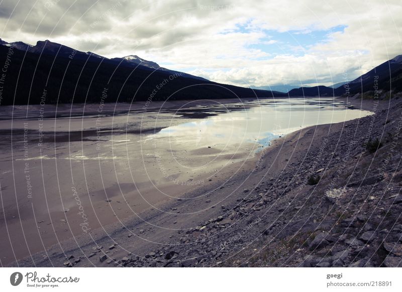 plug pulled Environment Nature Landscape Earth Sand Water Sky Clouds Autumn Climate change Hill Rock Mountain Peak Snowcapped peak Lake Medicine Lake Canada