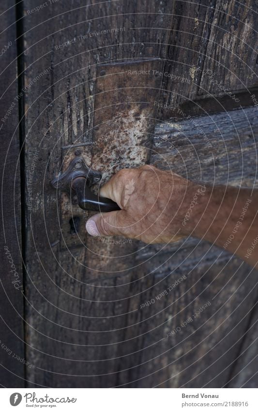 access Masculine Skin Hand 1 Human being House (Residential Structure) Door Curiosity Wooden door Old Door handle Grasp Undo Weathered Gray Brown Access Barn