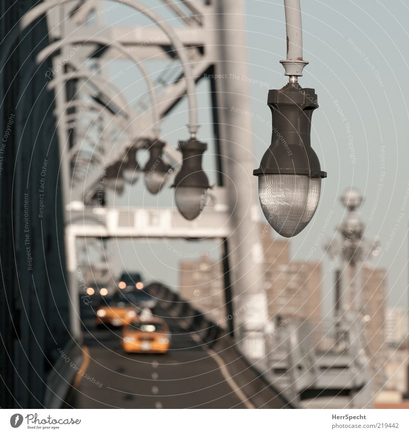 Crossing Williamsburg Bridge New York City East River Passenger traffic Motoring Street Car Brown Yellow Gray Perspective Lighting element Row Traffic lane