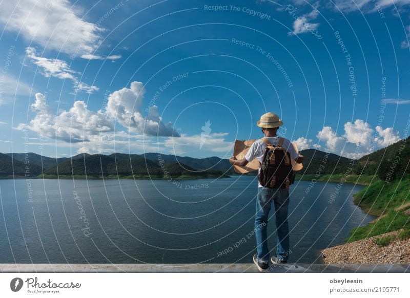 Young tourist boy looking a map stay alone at the mountain Lifestyle Vacation & Travel Tourism Trip Adventure Sightseeing Summer Mountain Child Boy (child) Man