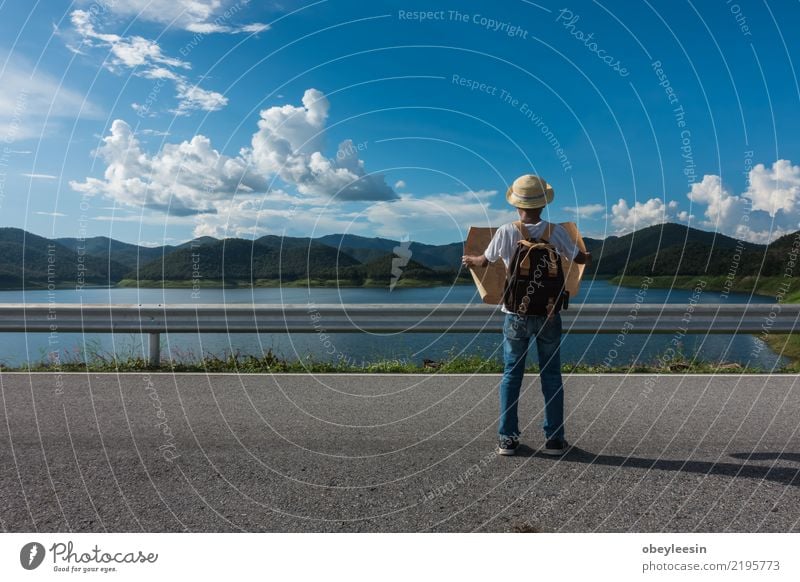 Young tourist boy looking a map stay alone at the mountain Lifestyle Vacation & Travel Tourism Trip Adventure Sightseeing Summer Mountain Child Boy (child) Man