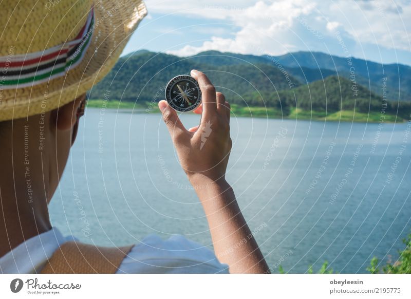 Hand with compass at mountain road at blue sky Lifestyle Vacation & Travel Tourism Trip Adventure Ocean Mountain Human being Nature Coast Lanes & trails