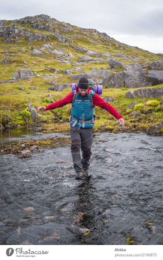 Young man crosses a river Vacation & Travel Adventure Hiking Youth (Young adults) 1 Human being Nature Water River Norway Walking Authentic Infinity Natural