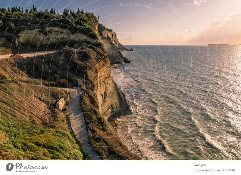 View of the wooded cliffs of Logas Beach, Corfu Nature Landscape Earth Water Sky Clouds Horizon Summer Tree Grass Bushes Forest Rock Waves coast