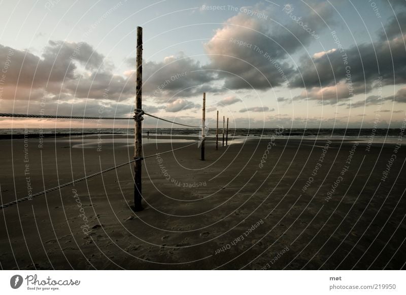 watt Environment Nature Landscape Sky Clouds Horizon Summer North Sea Ocean Island Wangerooge Vacation & Travel Dark Free Blue Brown Moody Mud flats Fence post