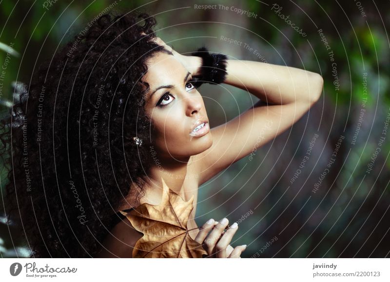 Black woman with autumn leaf in her hand. Beautiful Body Hair and hairstyles Skin Face Make-up Human being Feminine Young woman Youth (Young adults) Woman