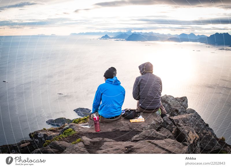 Summit photo of two young men over the North Sea, Lofoten Ocean Island Young man Youth (Young adults) Life 2 Human being Landscape Peak Lofotes Authentic Free