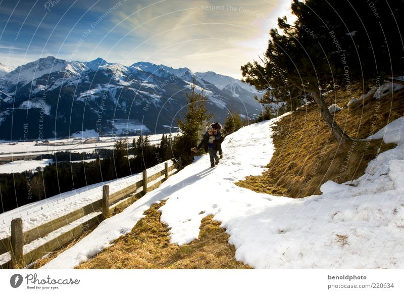 Lovers on a winter walk Lifestyle Happy Leisure and hobbies Tourism Trip Winter Snow Winter vacation Mountain Hiking Couple 2 Human being Landscape Elements