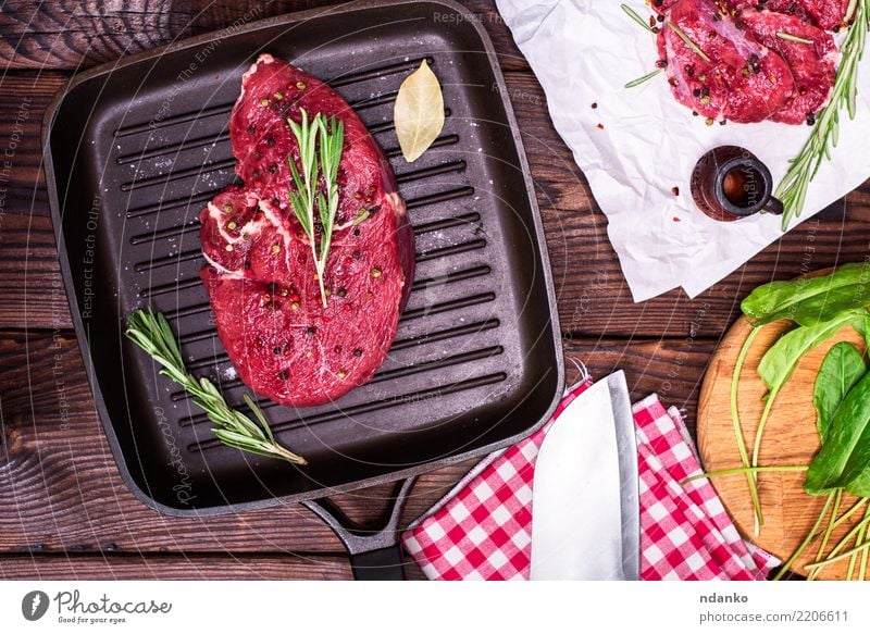 raw beef steak in spices Meat Herbs and spices Dinner Table Paper Wood Fresh Green Red Beef Blood Chop Cut Gourmet Ingredients Loin Meal napkin Organic Product