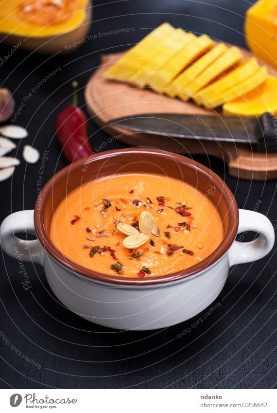 pumpkin soup in a ceramic plate Vegetable Soup Stew Herbs and spices Nutrition Eating Lunch Dinner Organic produce Vegetarian diet Diet Plate Table Hallowe'en