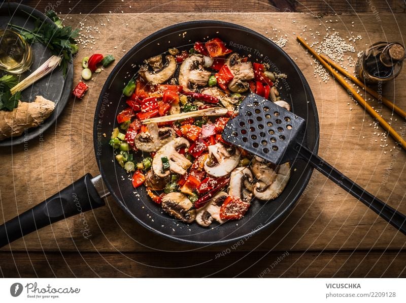 Vegan stir fry in pan on wooden background Food Vegetable Nutrition Organic produce Vegetarian diet Diet Asian Food Pan Life Design Style Vegan diet Dish