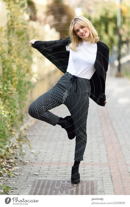 Funny blonde woman smiling in urban background. Beautiful Hair and hairstyles Face Human being Feminine Young woman Youth (Young adults) Woman Adults 1