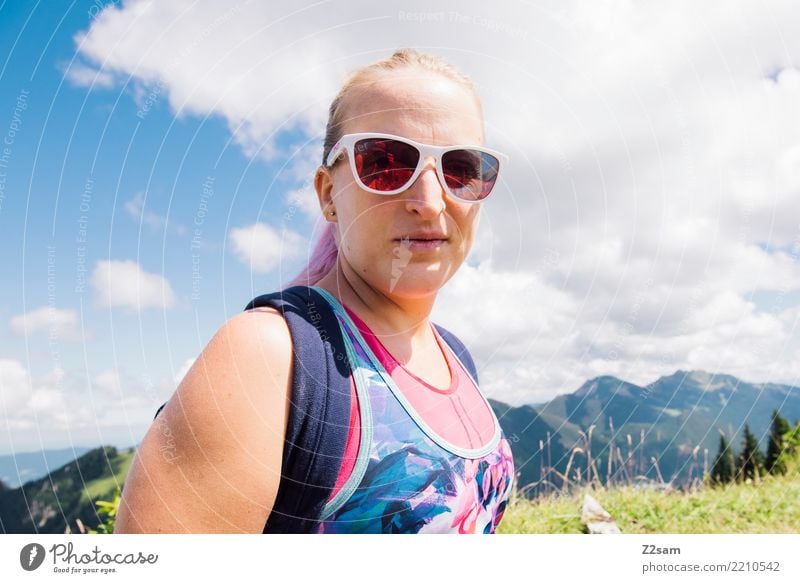 Young hiker in the mountains Lifestyle Hiking Feminine Young woman Youth (Young adults) 18 - 30 years Adults Nature Landscape Sky Summer Beautiful weather Alps