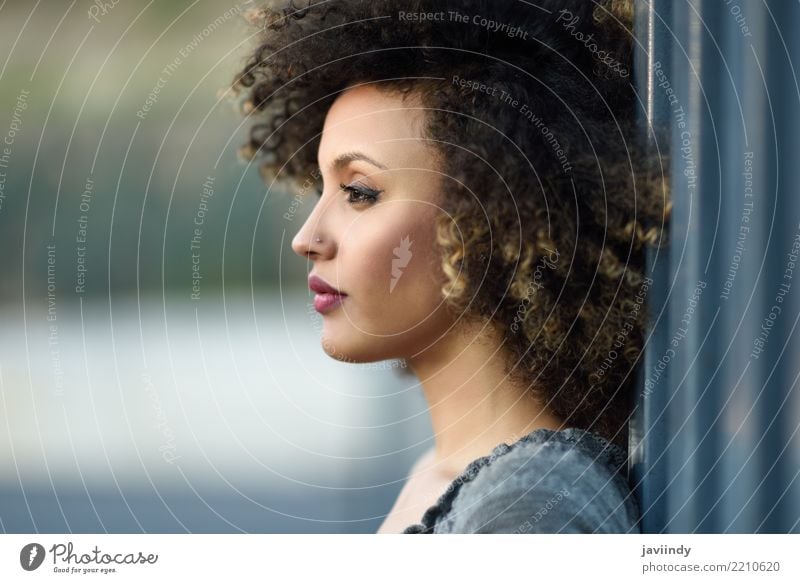 Young mixed woman with afro hairstyle standing in urban background. Lifestyle Style Happy Beautiful Hair and hairstyles Face Human being Woman Adults Street