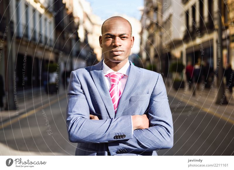 Handsome black man wearing suit in urban background Happy Beautiful Success Business Human being Masculine Man Adults 1 18 - 30 years Youth (Young adults)