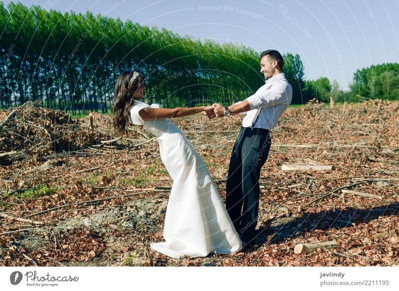 Just married couple together in poplar background Happy Beautiful Feasts & Celebrations Wedding Young woman Youth (Young adults) Young man Woman Adults Man