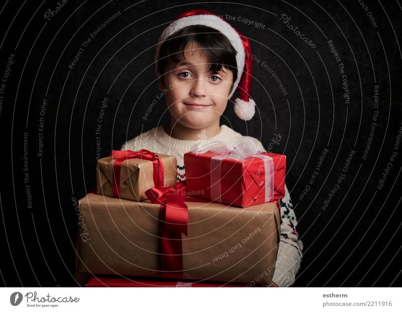 happy child with gifts at christmas Lifestyle Shopping Vacation & Travel Winter Party Event Feasts & Celebrations Christmas & Advent New Year's Eve Human being