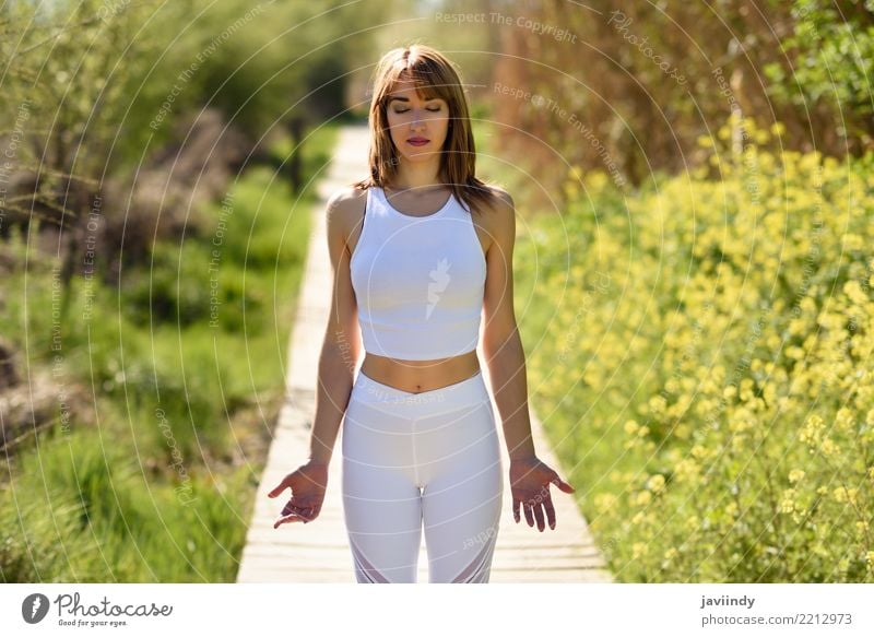 Young woman doing yoga on wooden road in nature. Lifestyle Happy Beautiful Body Relaxation Meditation Summer Sports Yoga Human being Feminine Woman Adults 1