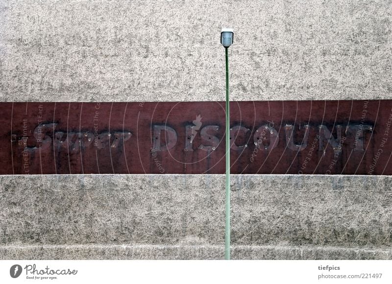 super. discount. Wall (barrier) Wall (building) Facade Old Dirty Retro Poverty Esthetic Gloomy Neukölln Street lighting Great Supermarket Cheap Shabby