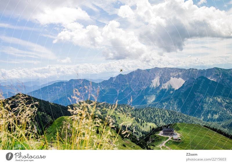 Helicopter in front of a mountain scenery Mountain Nature Landscape Summer Beautiful weather Bushes Alps Flying Esthetic Gigantic Infinity Natural Blue Green