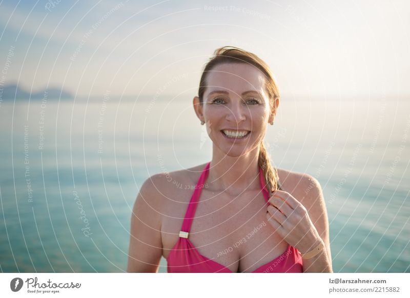 Happy smiling middle-aged woman at the seaside Beautiful Skin Face Wellness Relaxation Vacation & Travel Tourism Summer Beach Ocean Woman Adults 1 Human being